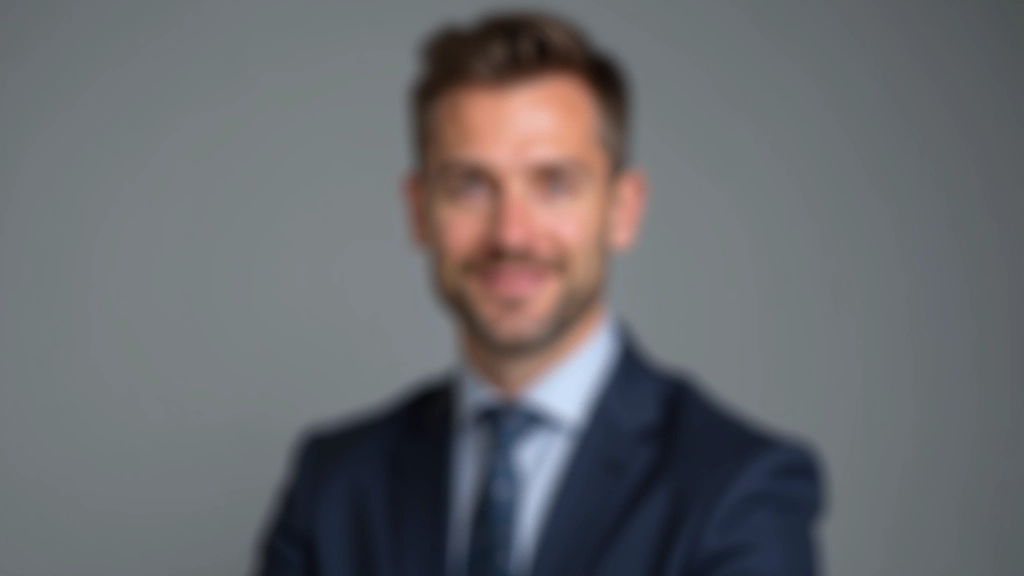 Professional headshot of male business executive